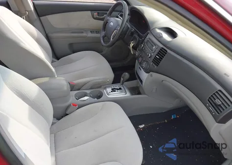 2007 Kia Optima Lx z USA, uszkodzony, nr VIN KNAGE123175148097